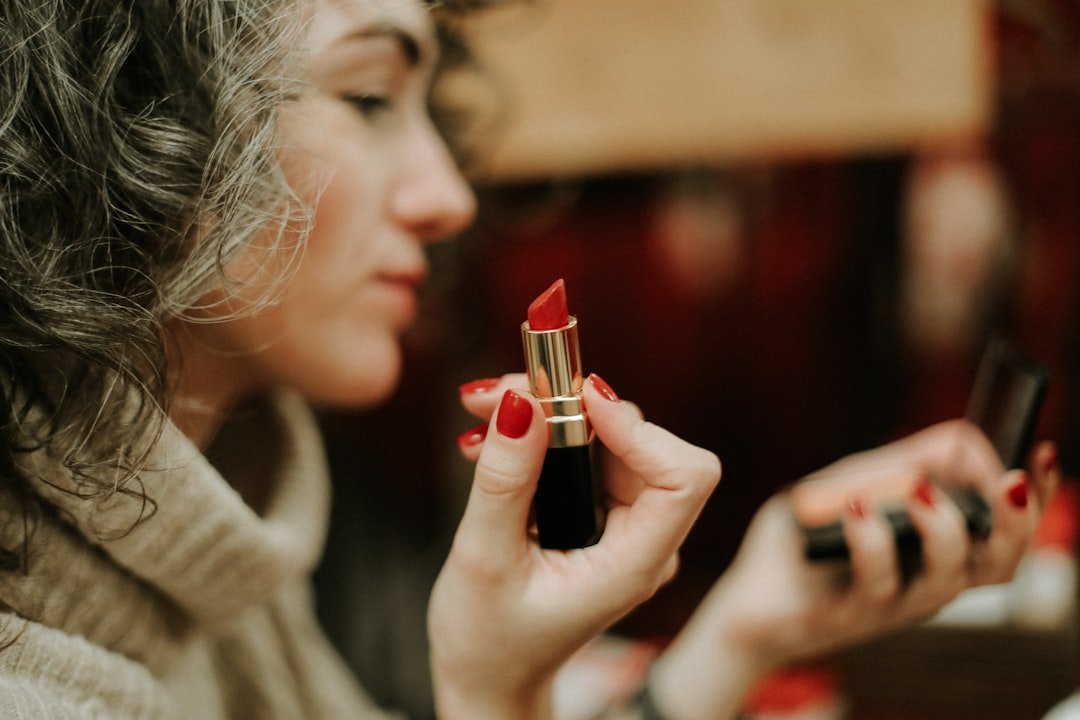 Woman applying an easy everyday lip color