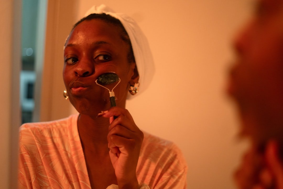 At-home beauty device prepared beside its instructions