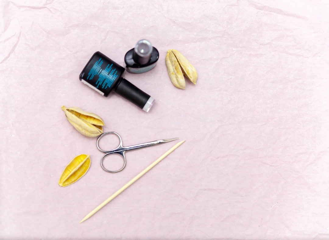 Home manicure tools and nail polish arranged on a table